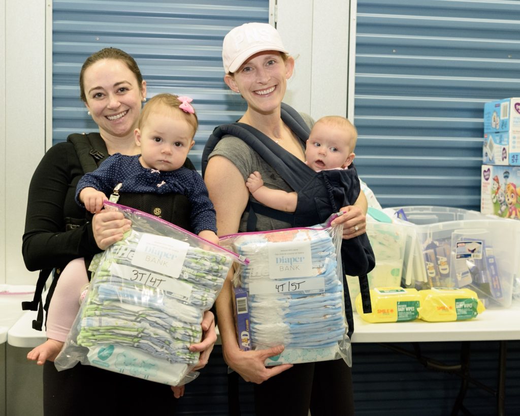 The Junior League of Tampa Diaper Bank Committee Members at monthly packing event