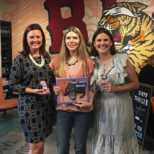 2018 HGM YEP Winner Rebekah Phillips with Junior League of Tampa Leadership Director Ashley Watters and President Isabel Dewey